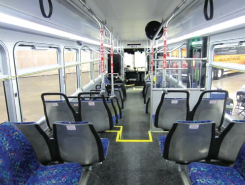 The interior of Metro Transit bus number 1300, built in 2011, seen from the back seat. © Jaron McNamara/TheTransitCamera on Flickr
