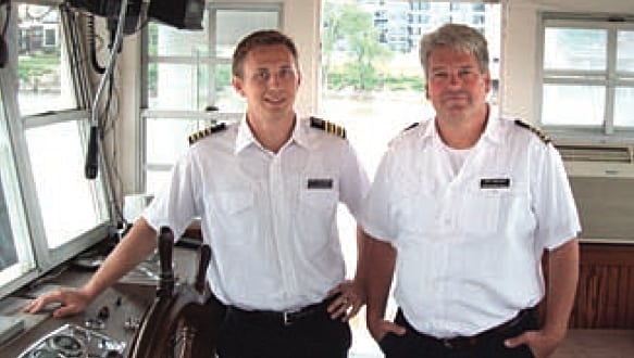 Photo courtesy Bob DeckCaptain Bob Deck (R) with his son Cullen, on the bridge of the Betsey Northrup paddleboat